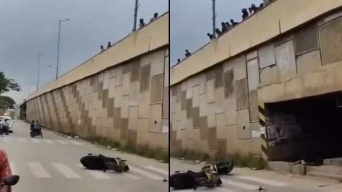व्हील स्टंट करना पड़ा भारी, टक्कर लगने के बाद लोगों ने फ्लाईओवर से नीचे फेंकी बाइक