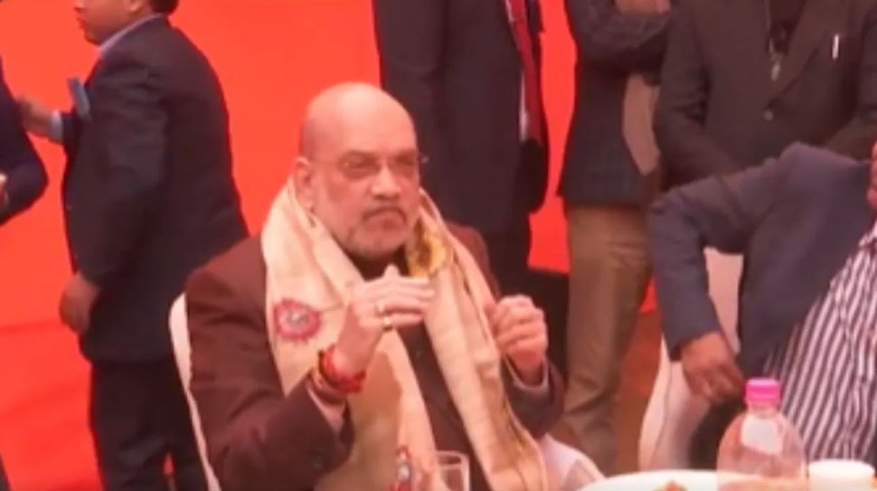 जेडीयू नेता संजय झा के दही-चूड़ा कार्यक्रम में पहुंचे अमित शाह